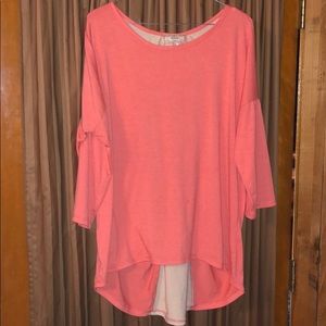 Soft coral shirt with detailed back